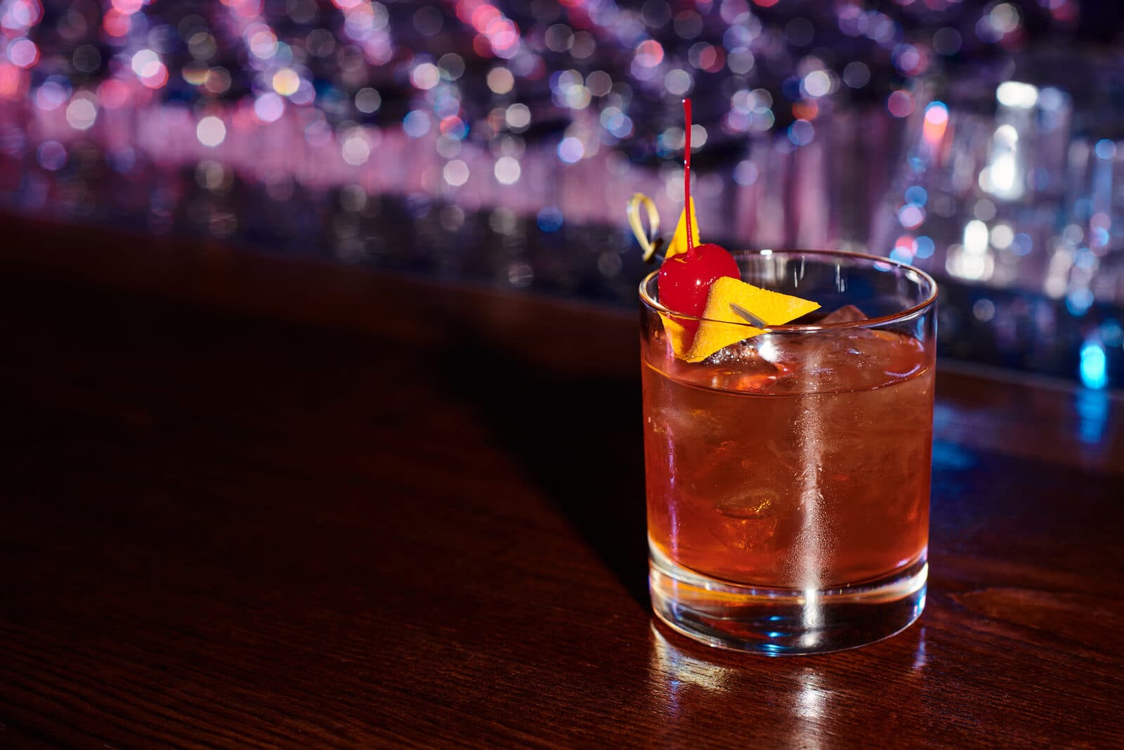 A craft cocktail on the bar at Bullfrog